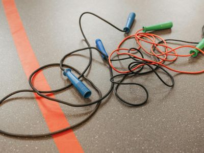 Close up of a jump rope on a wooden floor
